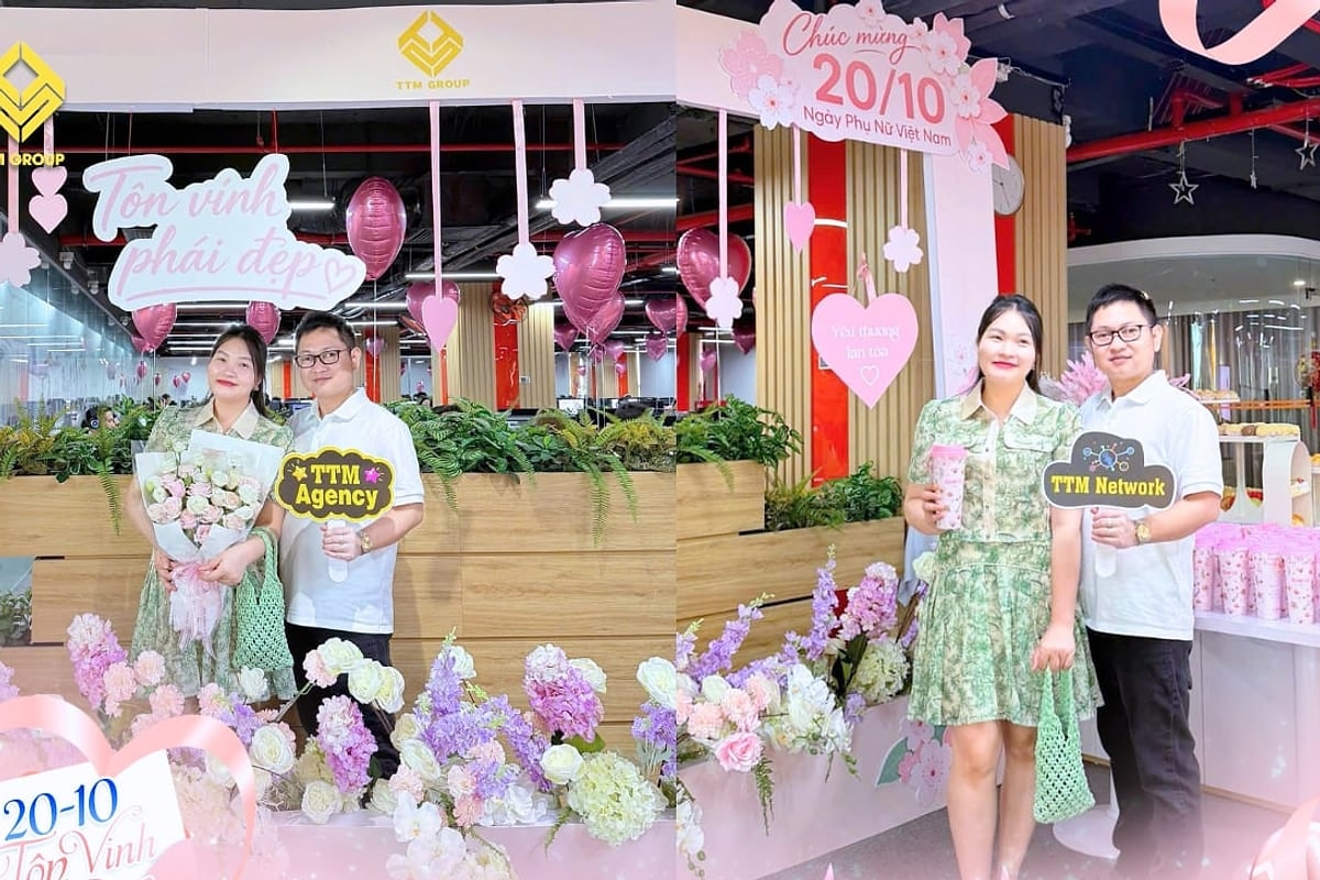 Chụp ảnh kỷ niệm dưới cổng hoa Tôn Vinh Phái Đẹp